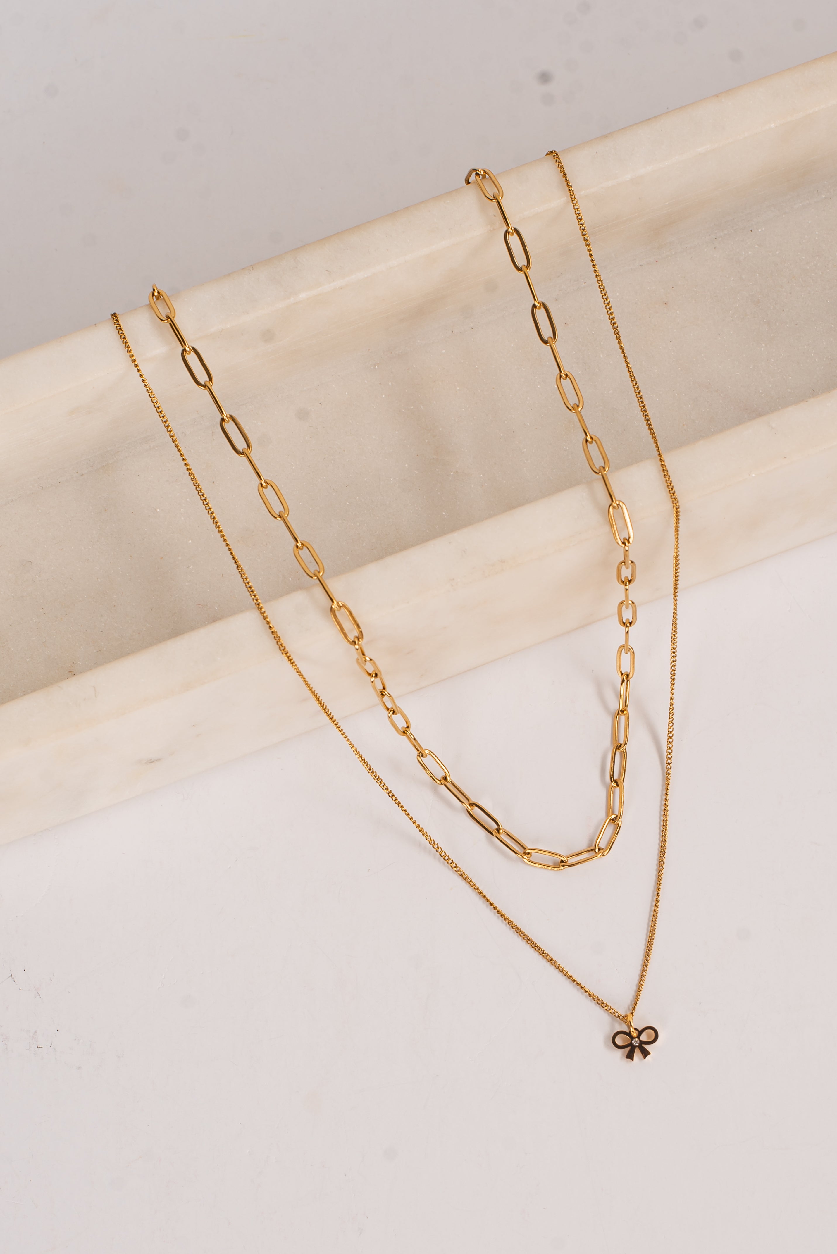 Jada Gold Layered Bow Charm Necklace
