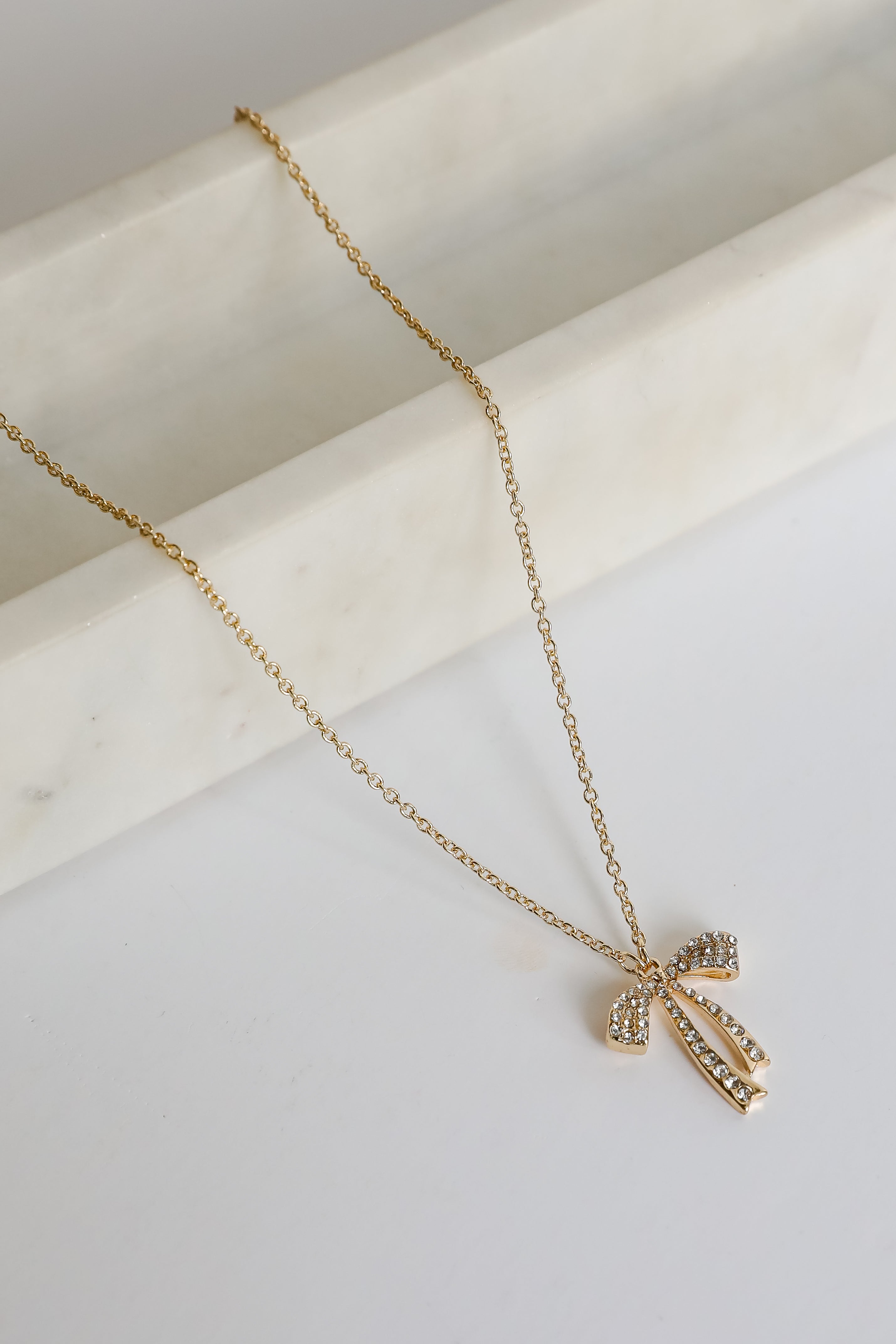 Camila Gold Rhinestone Bow Charm Necklace