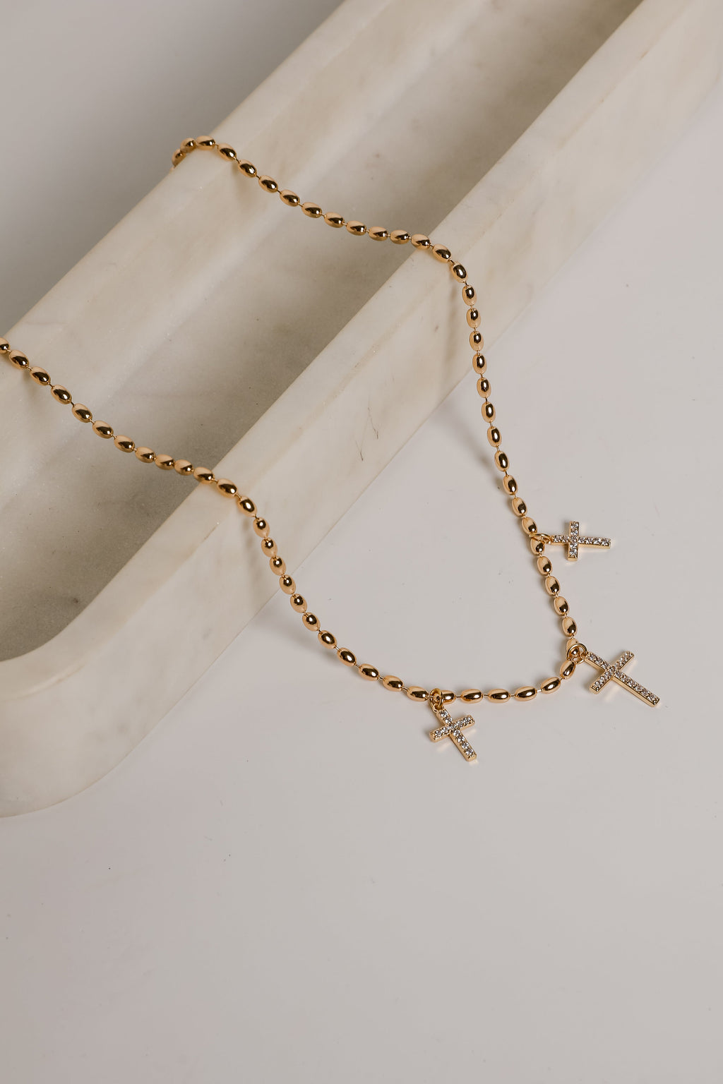 Naomi Gold Cross Charm Necklace