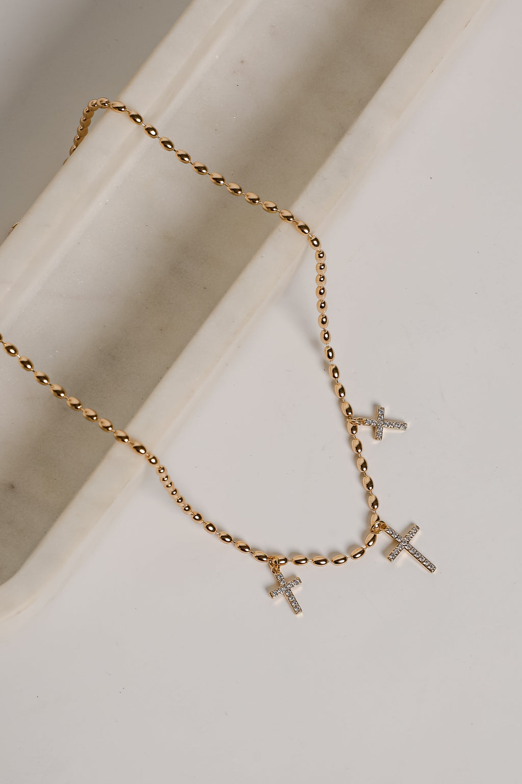Naomi Gold Cross Charm Necklace