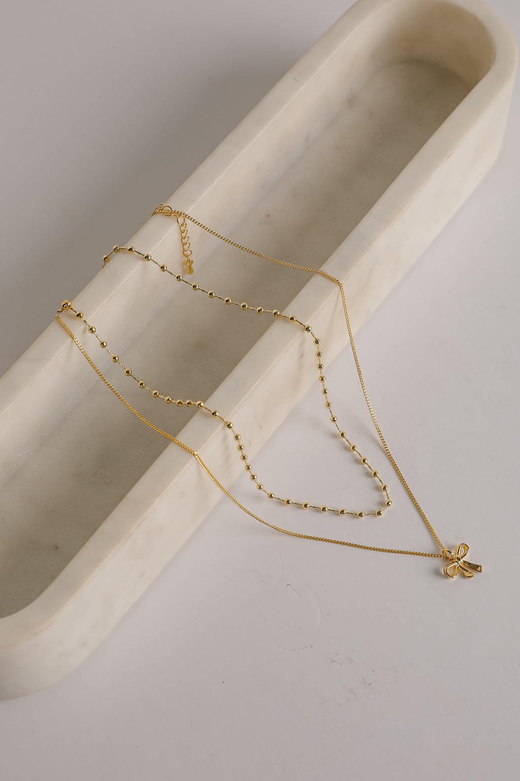 Allie Gold Layered Bow Charm Necklace