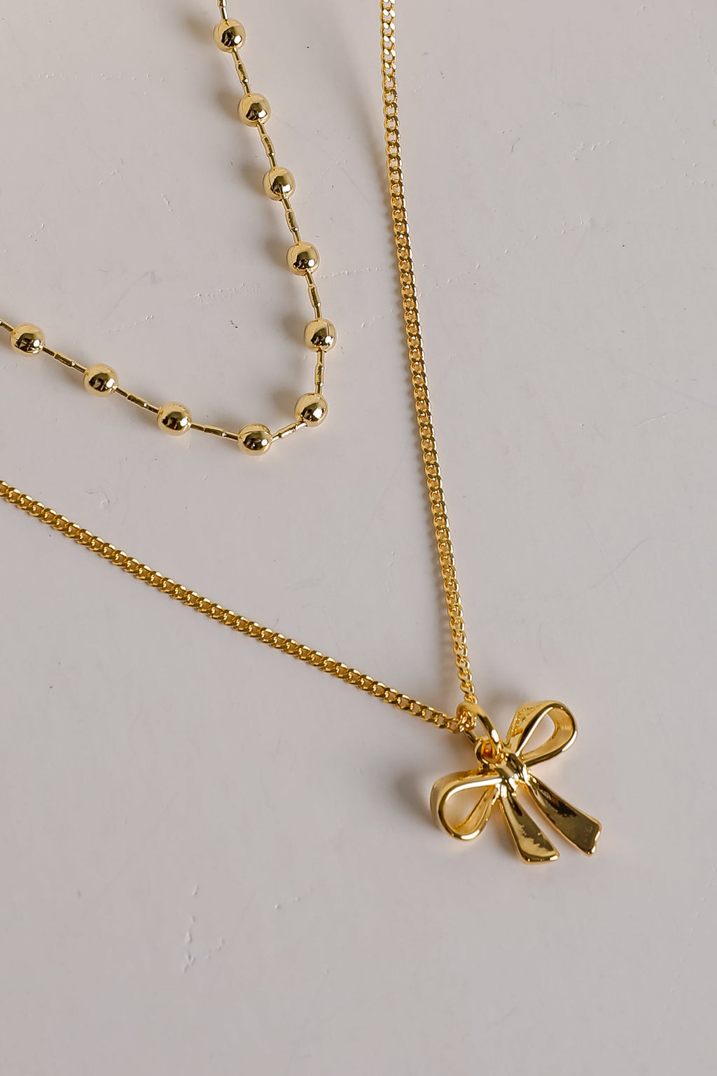 Allie Gold Layered Bow Charm Necklace